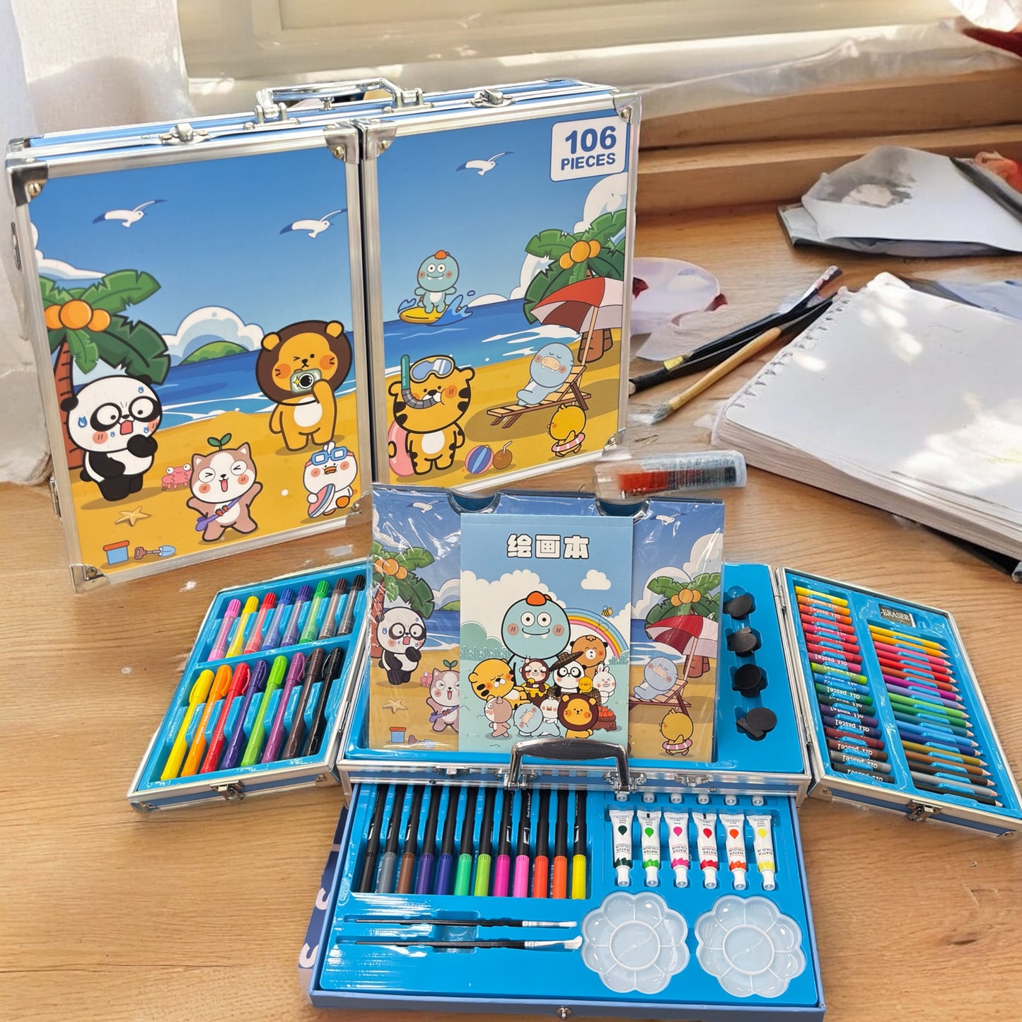 COLOUR KIT 106 PCS with a coloring book and a drawer filled with paint set and markers